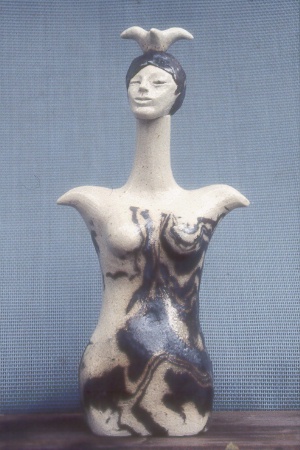 bottle- woman w bird stopper L.jpg (58368 bytes)